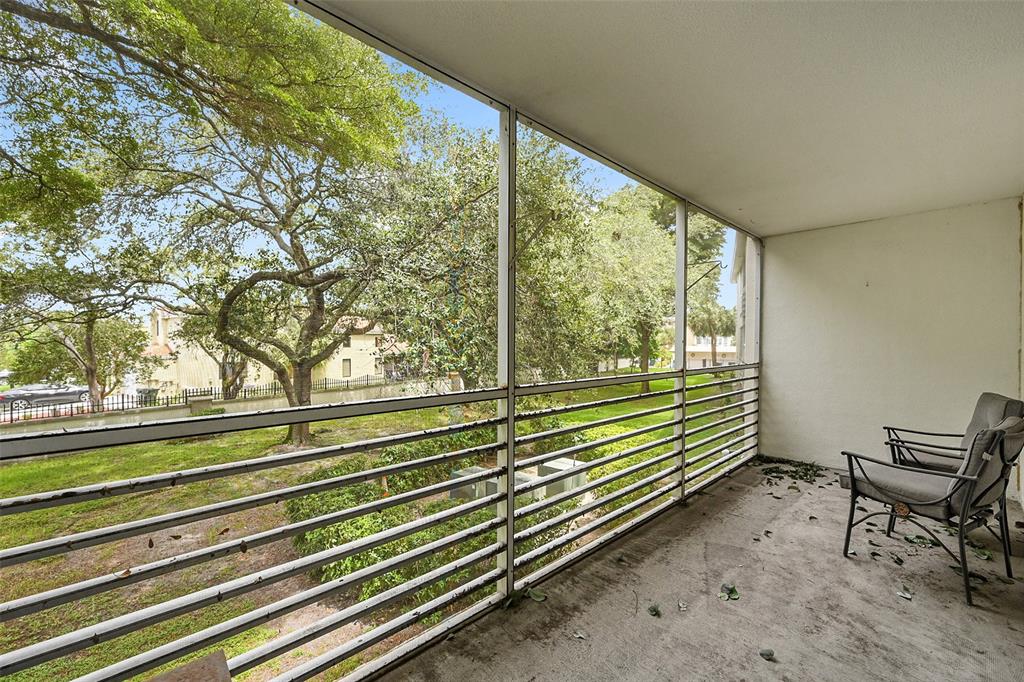 1901 Bermuda Circle, Unit F2 Coconut Creek, FL 33066 - Photo 20 of 26 a view of a two chair in the balcony