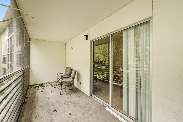 a view of a workspace with furniture