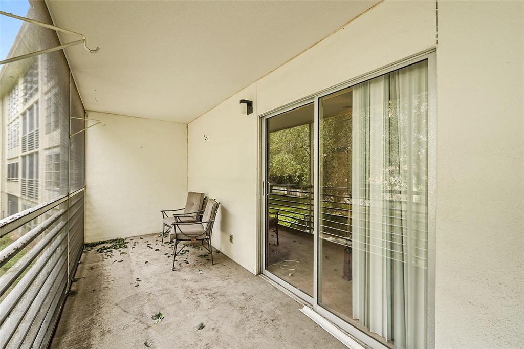 1901 Bermuda Circle, Unit F2 Coconut Creek, FL 33066 - Photo 21 of 26 a room with furniture