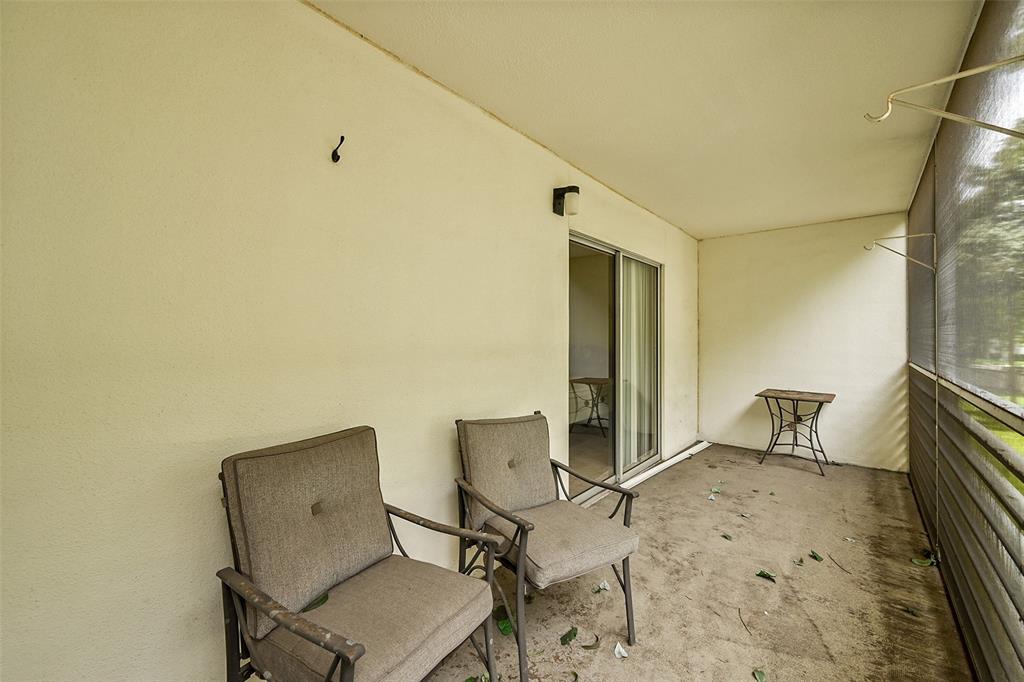 1901 Bermuda Circle, Unit F2 Coconut Creek, FL 33066 - Photo 22 of 26 a view of a workspace with furniture