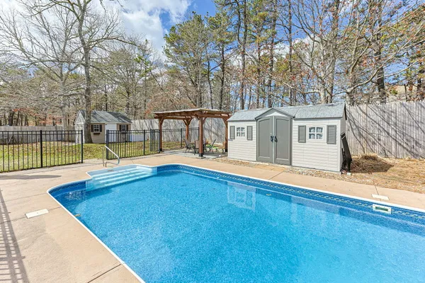 a view of a house with a swimming pool
