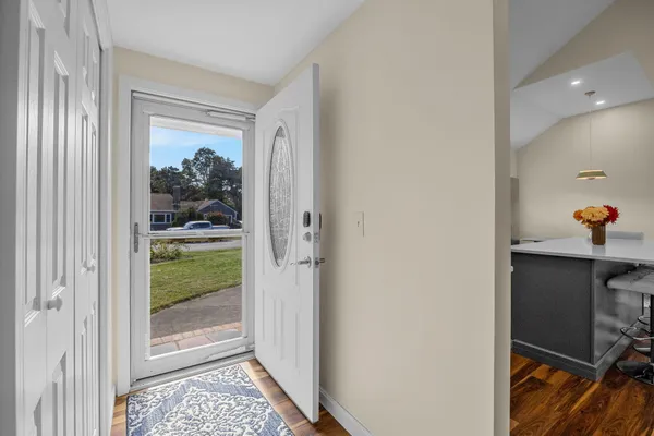 a view of a hallway and a living room