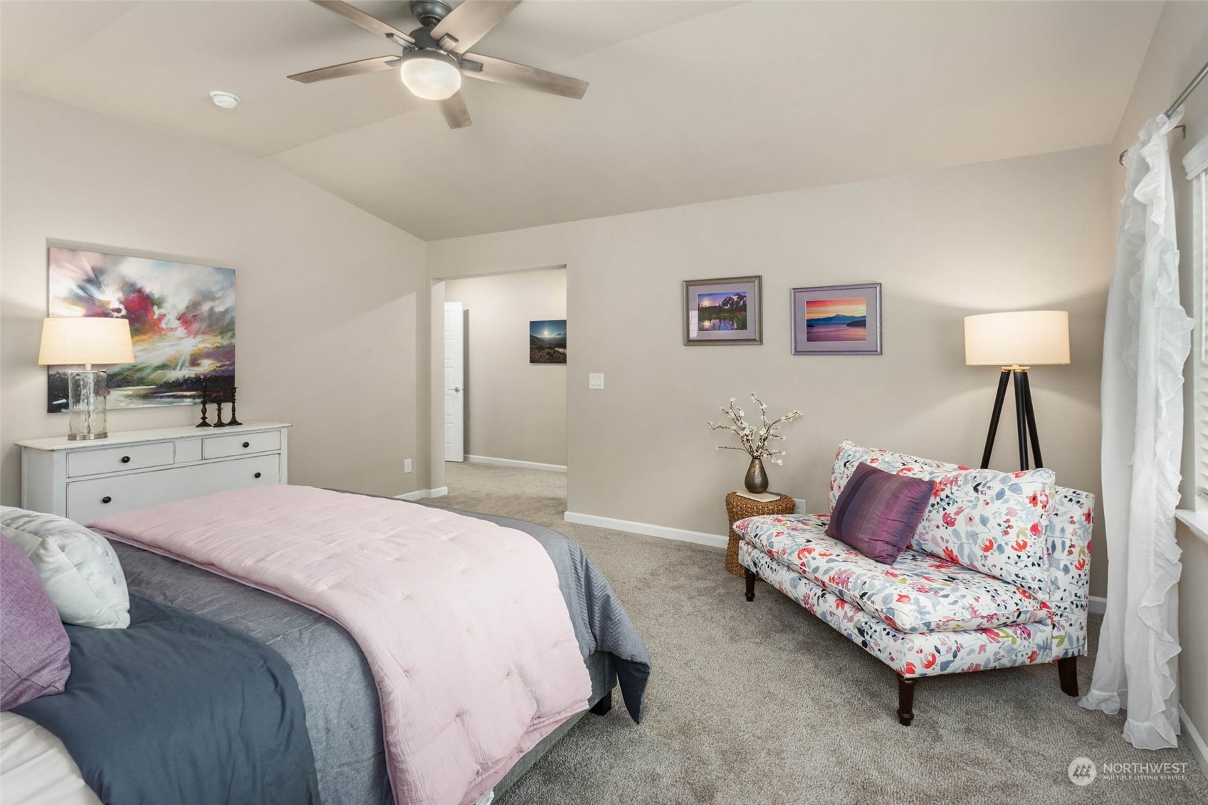 217 178th Street Southeast Bothell, WA 98012 - Photo 19 of 37 a spacious bedroom with a bed and a flat screen tv