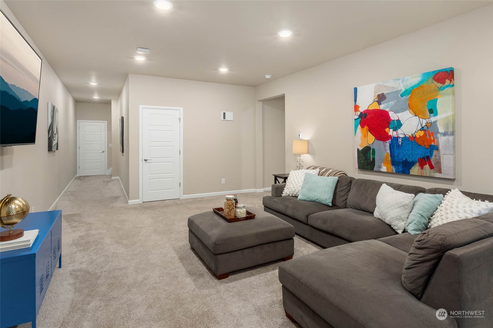 217 178th Street Southeast Bothell, WA 98012 - Photo 30 of 37 a living room with furniture and a flat screen tv
