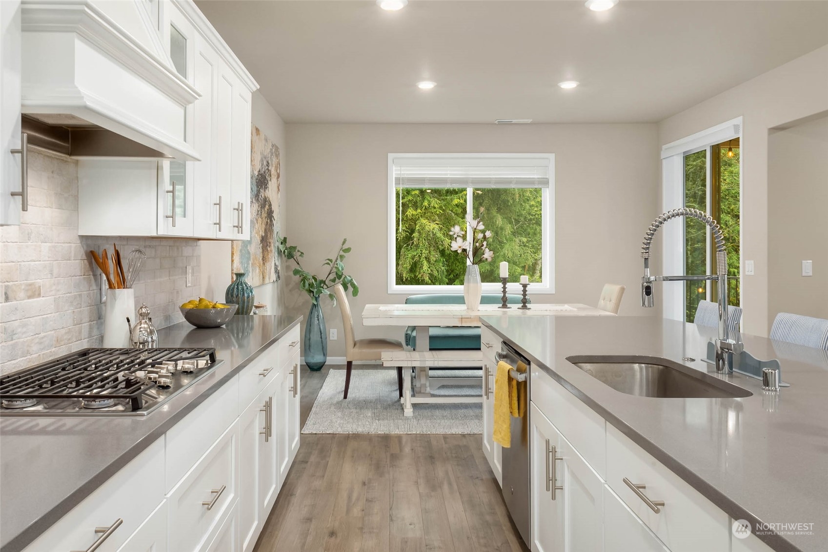 217 178th Street Southeast Bothell, WA 98012 - Photo 10 of 37 a kitchen with sink a stove and cabinets