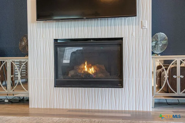 a living room with a fireplace