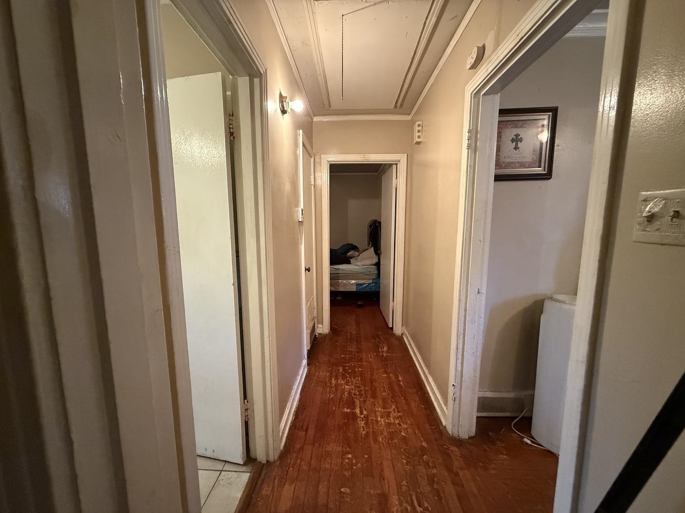 1309 Semmes Street Memphis, TN 38111 - Photo 14 of 24 Hall featuring attic access, dark wood finished floors, and ornamental molding