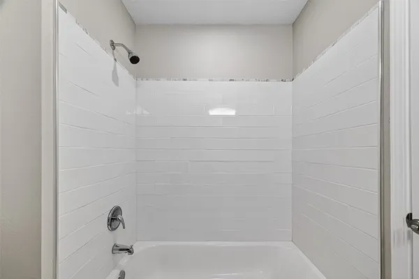 a bathroom with a bathtub