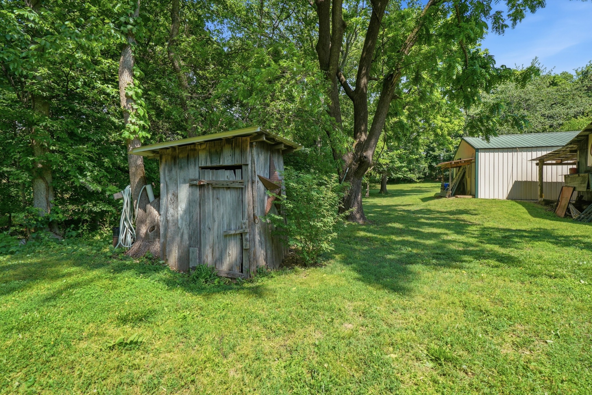 6471 Highway 161 Springfield, TN 37172 - Photo 46 of 57 a backyard of a house with lots of green space