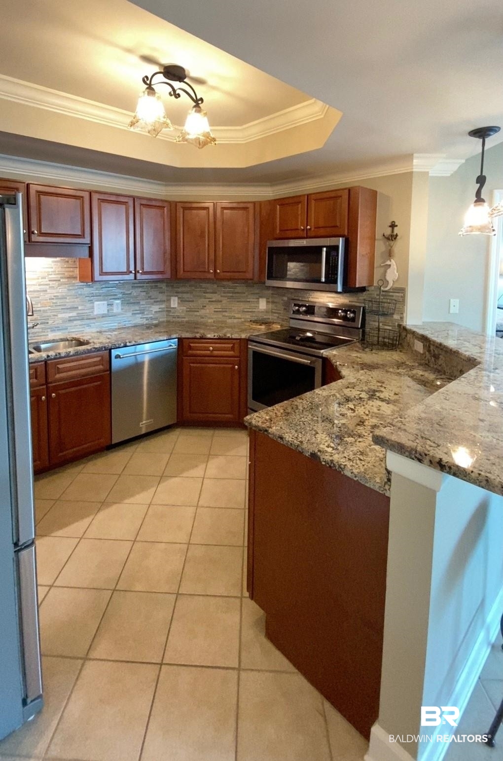 27582 Canal Road, Unit 2209 Orange Beach, AL 36561 - Photo 5 of 34 Like new granite top and tile backsplash