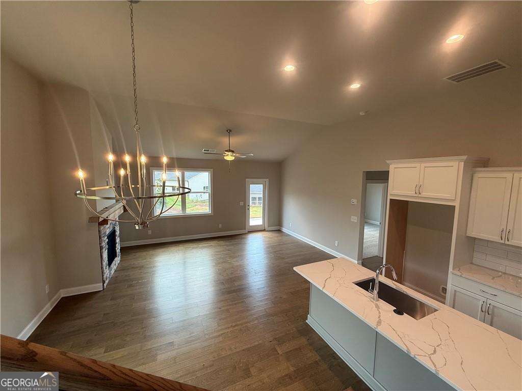 352 Lakeside Drive Canton, GA 30115 - Photo 5 of 16 a view of a room with window and wooden floor