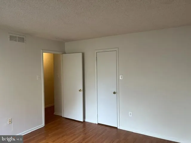 a view of small space with wooden floor