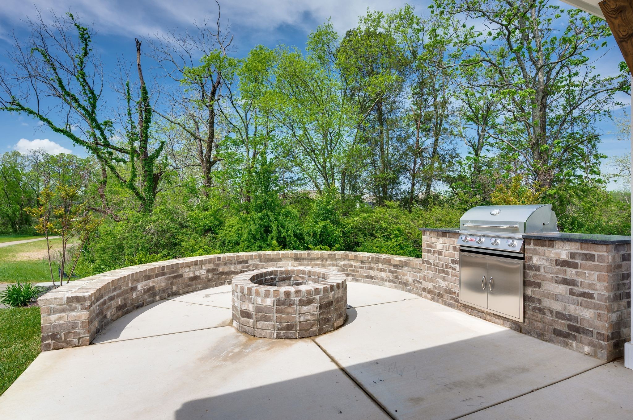141 Foxhall Dr Spring Hill Spring Hill, TN 37174 - Photo 2 of 2 a view of a back yard of the house