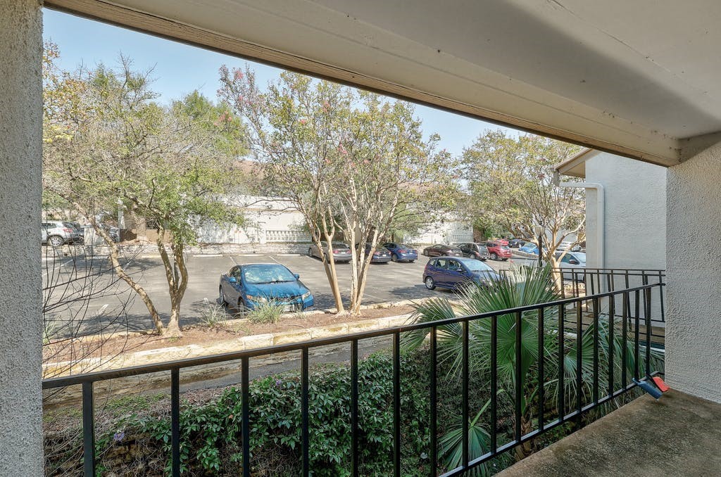 6910 Hart Lane, Unit 907 Austin, TX 78731 - Photo 4 of 28 a view of a street from a balcony