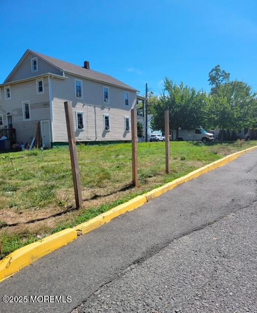 30 Institute Street Freehold, NJ 07728 - Photo 5 of 8 a view of a house with backyard and porch