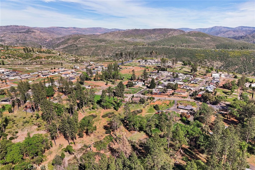 6130 Pentz Road Paradise, CA 95969 - Photo 9 of 14 an aerial view of mountain with residential house and green space