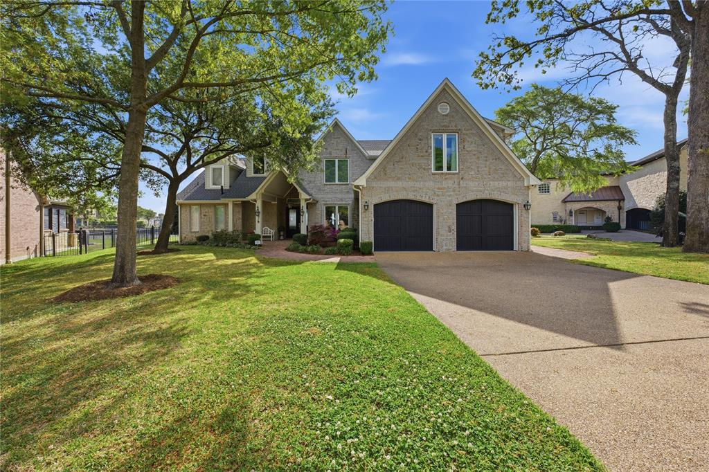121 St Annes Mabank, TX 75156 - Photo 5 of 40 a front view of a house with garden and trees