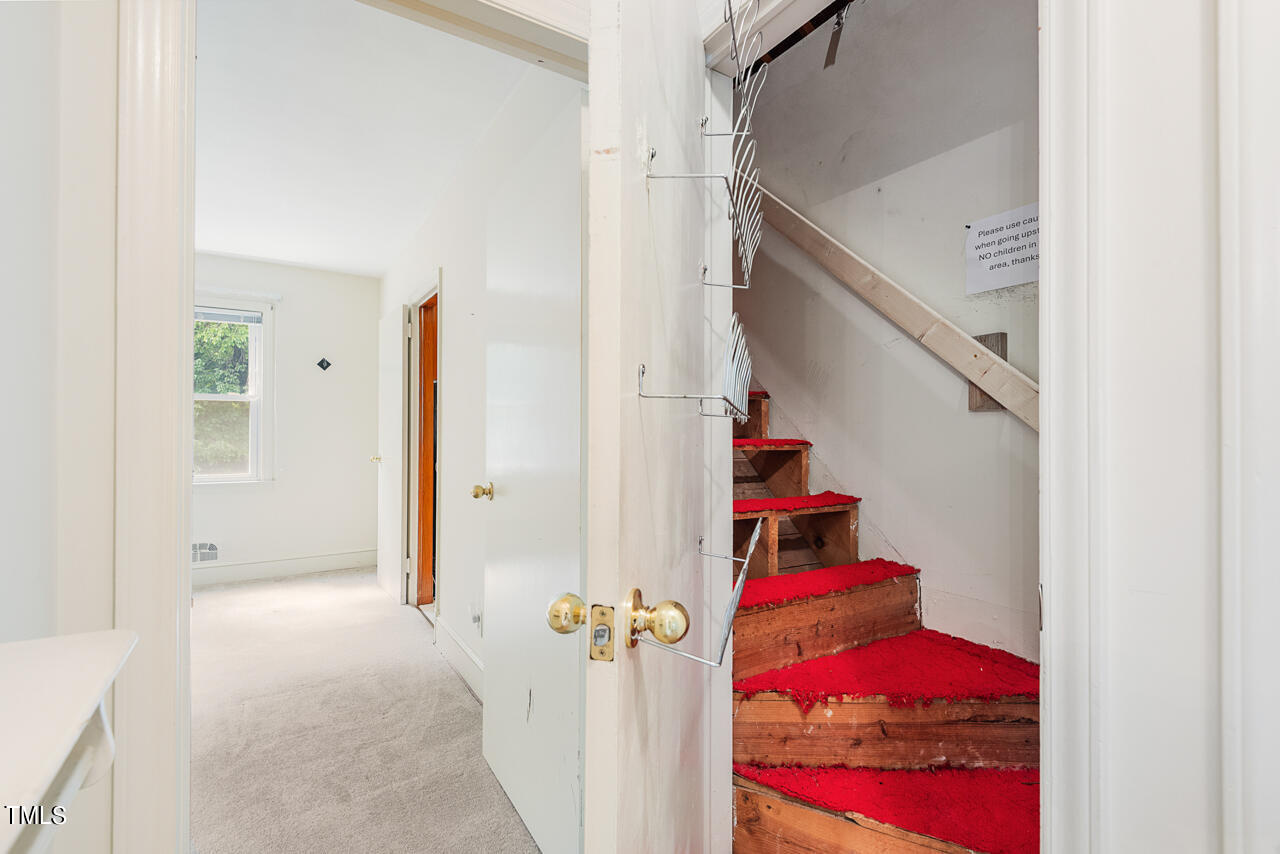 3203 Cole Mill Road Durham, NC 27705 - Photo 21 of 32 Hallway to Floored Attic