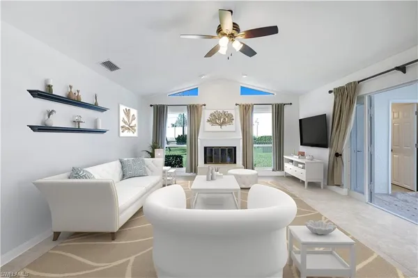 a view of a livingroom with furniture and window