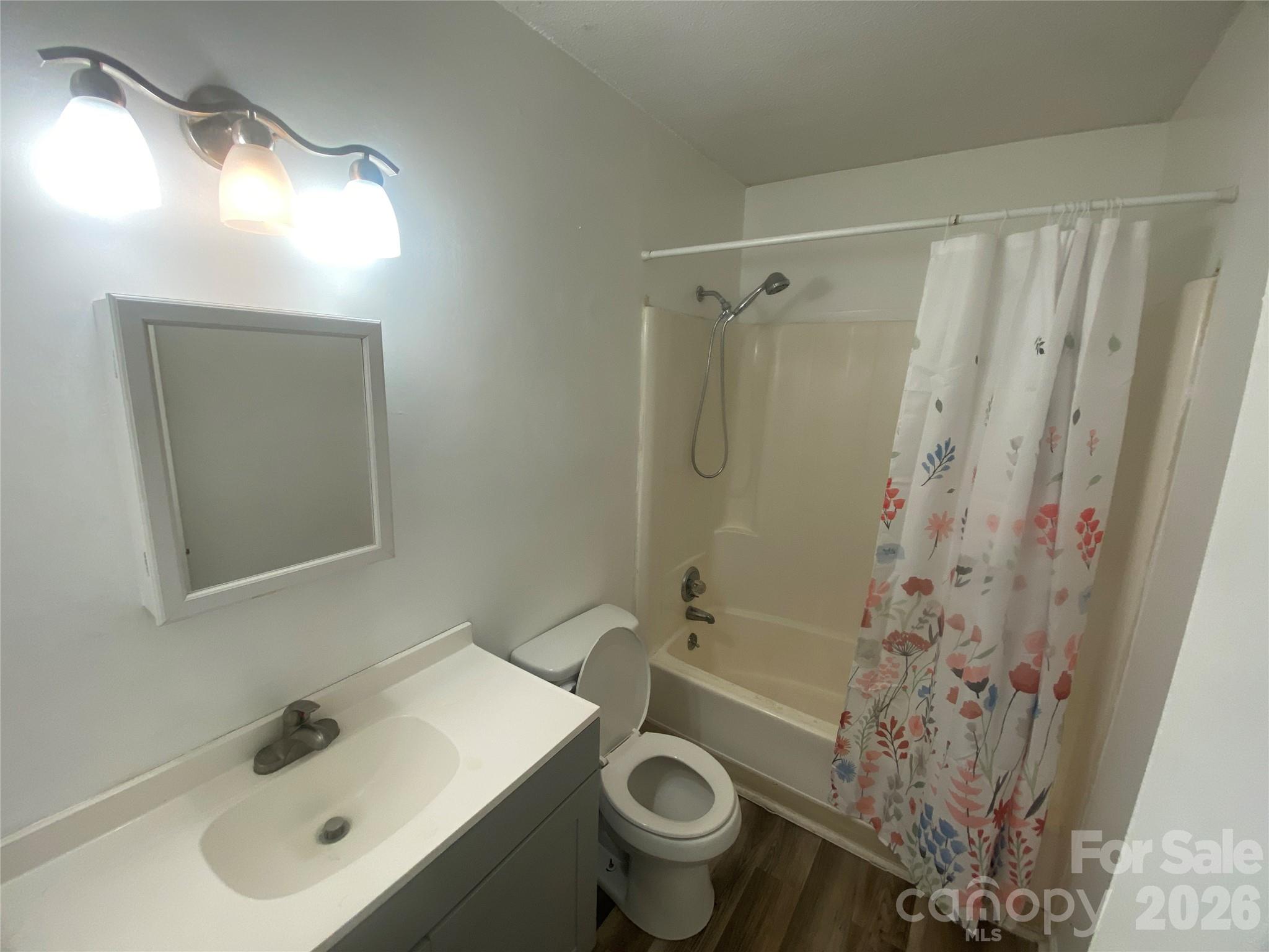 788 Coley Road Salisbury, NC 28146 - Photo 24 of 43 a bathroom with a sink toilet and shower