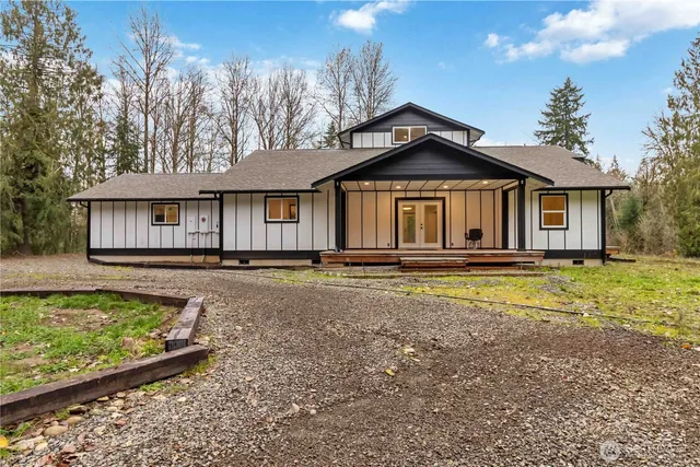 a house view with a garden space