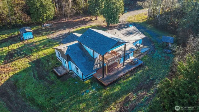 a view of a chairs in a backyard