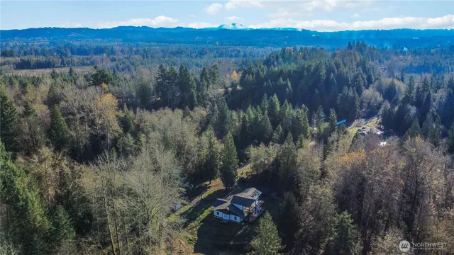 a view of a houses with a yard