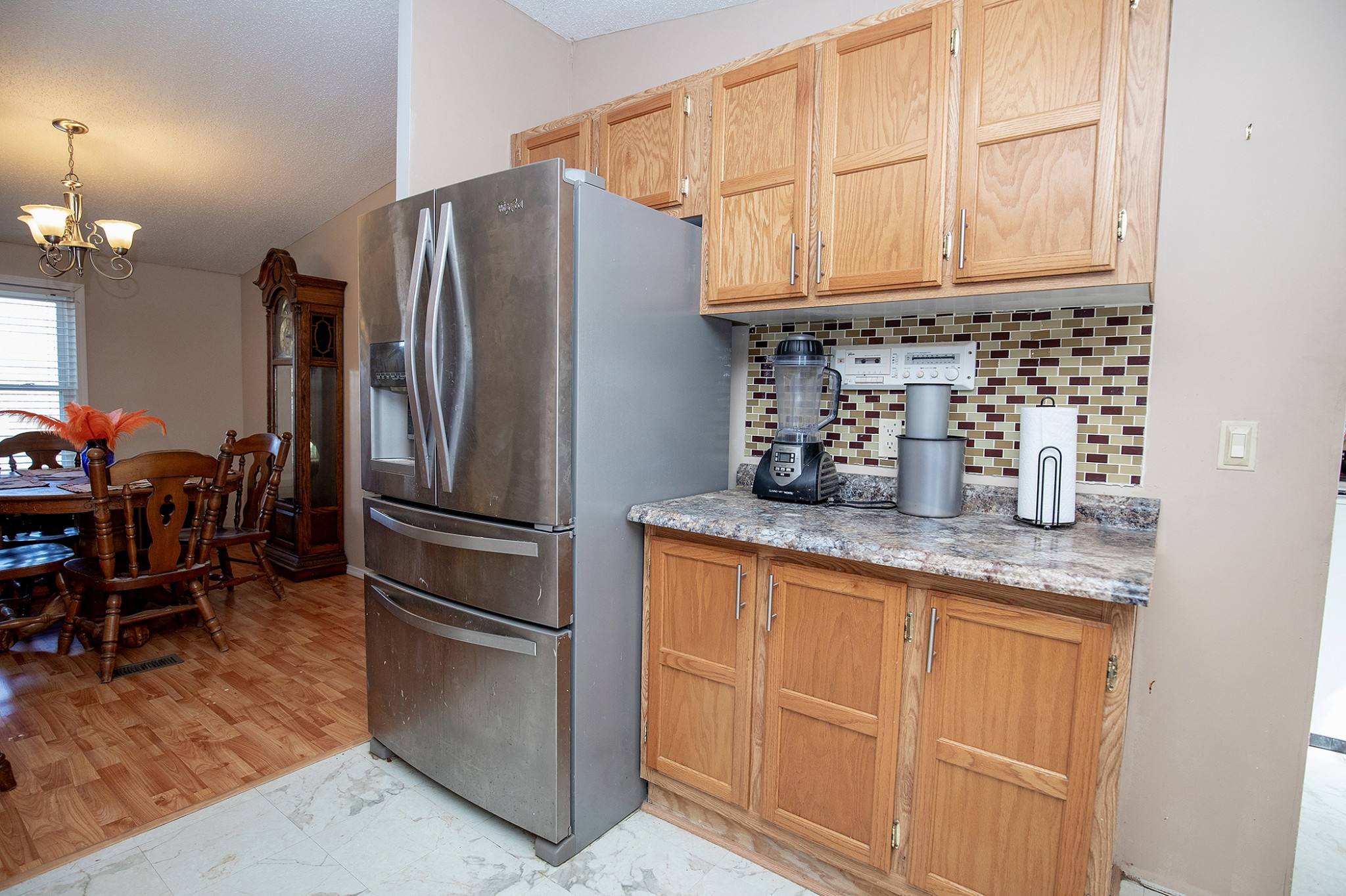 2113 Sugar Camp Road Springfield, TN 37172 - Photo 16 of 47 a kitchen with granite countertop a refrigerator and a sink