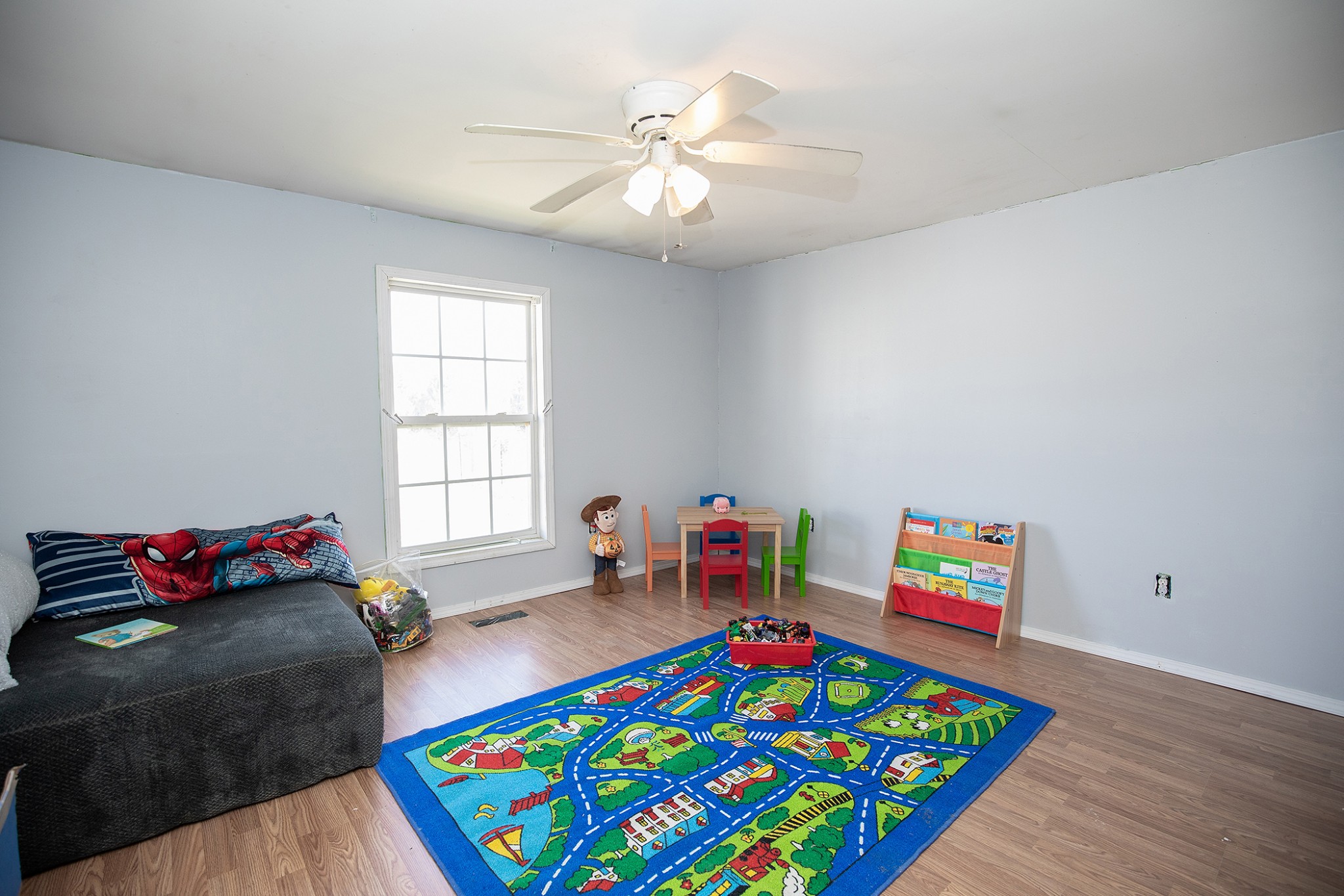 2113 Sugar Camp Road Springfield, TN 37172 - Photo 27 of 47 a bedroom with a bed and a wooden floor