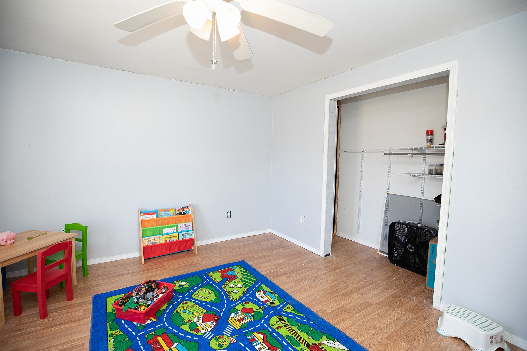 2113 Sugar Camp Road Springfield, TN 37172 - Photo 28 of 47 a bedroom with a bed and a bookshelf
