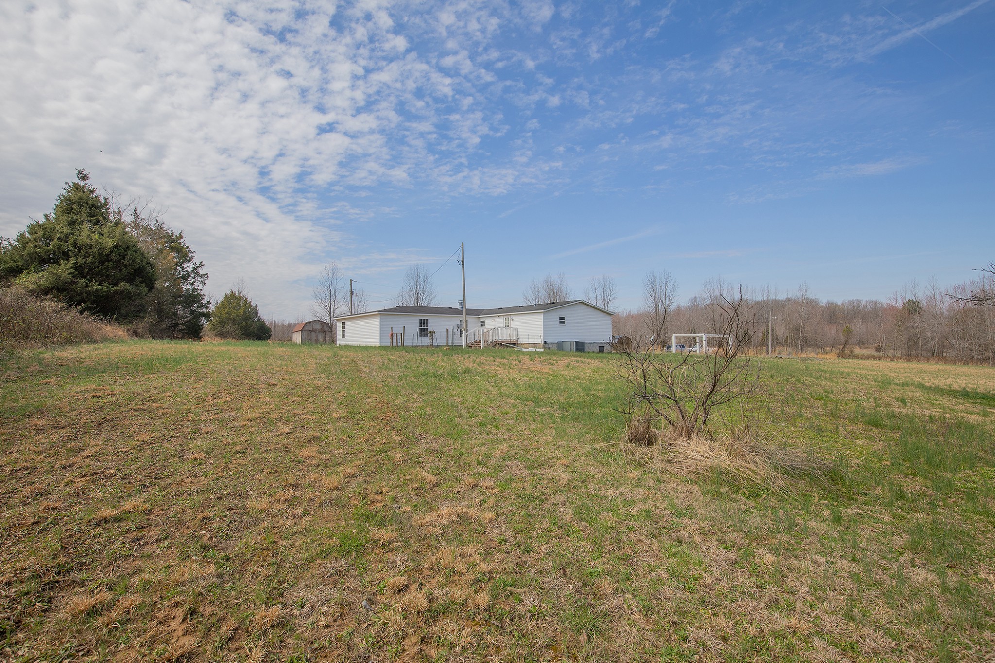 2113 Sugar Camp Road Springfield, TN 37172 - Photo 33 of 47 a big yard with lots of green space and fog