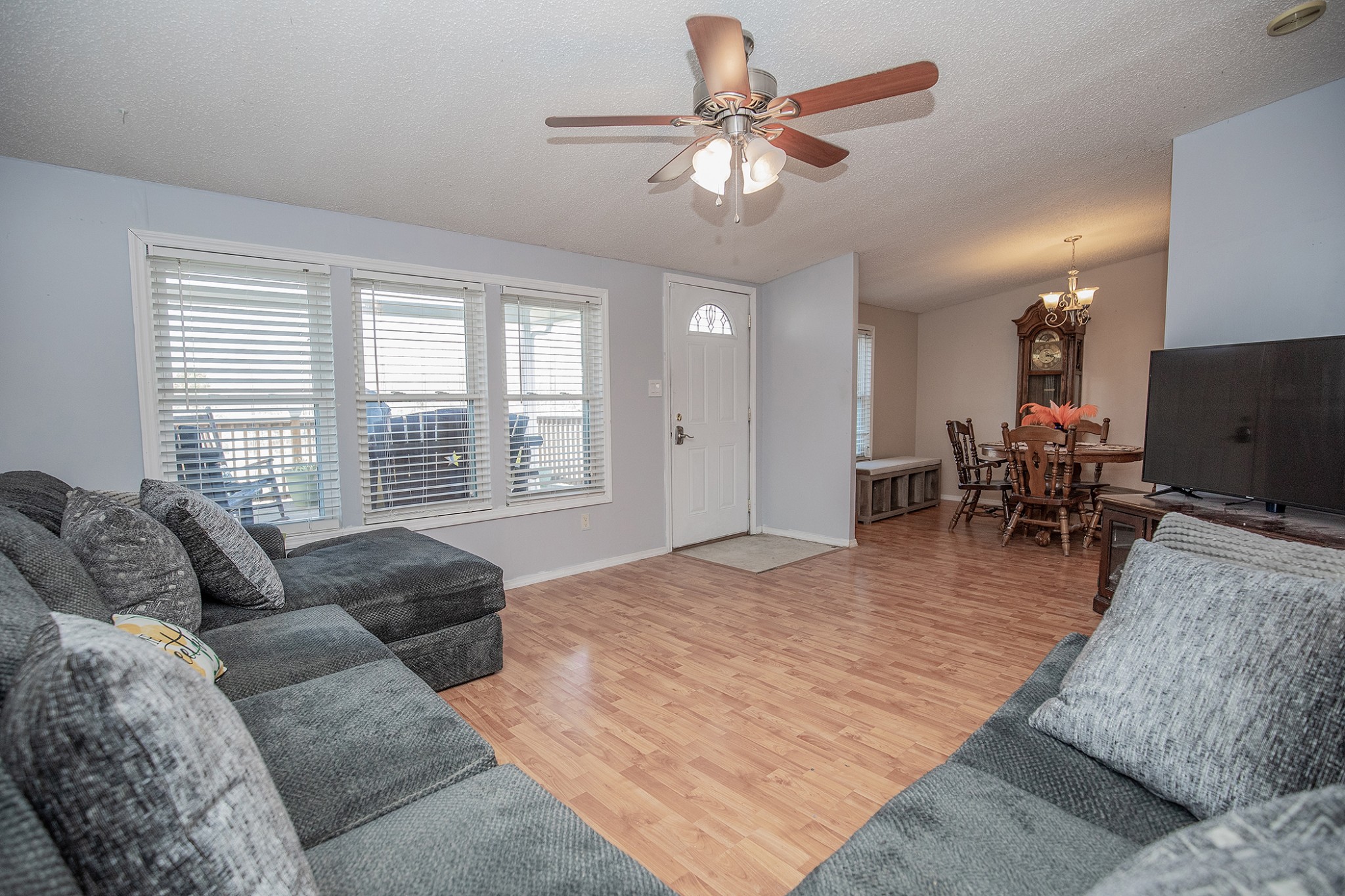 2113 Sugar Camp Road Springfield, TN 37172 - Photo 8 of 47 a living room with furniture a large window with kitchen view