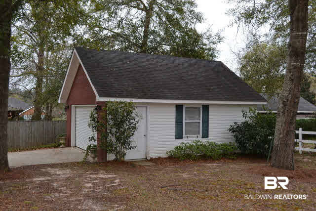 12191 Verona Court Foley, AL 36535 - Photo 17 of 21 Need space for up to 4 cars? This built-in-place 20x24 building has room for 2 cars in addition to the home's attached garage. The roll-up door insures plenty of overhead room for large projects