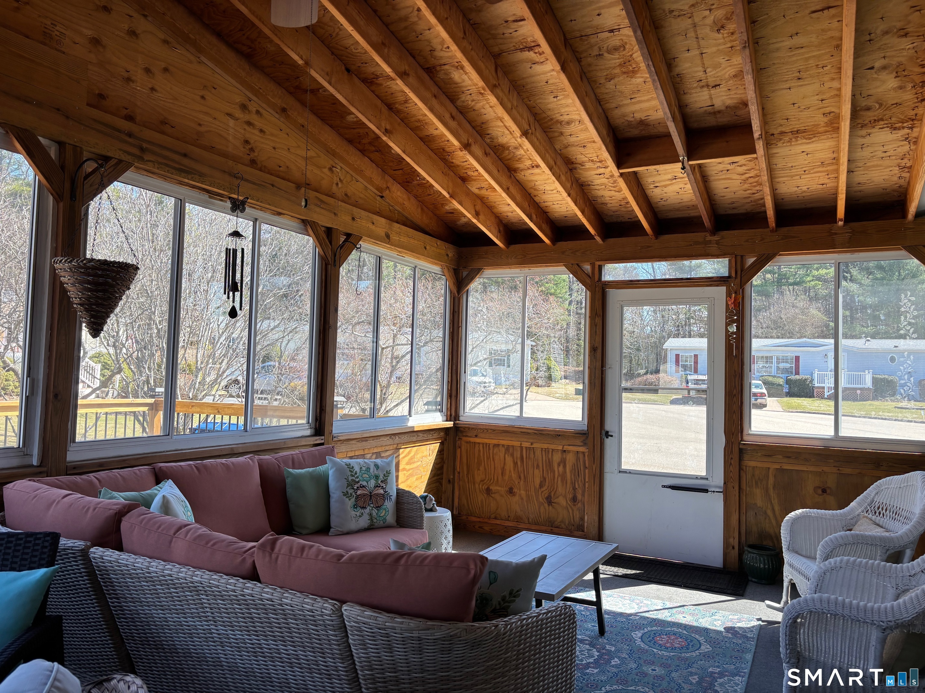 25 Kitty Lane Windham, CT 06256 - Photo 15 of 39 a living room with furniture and a large window