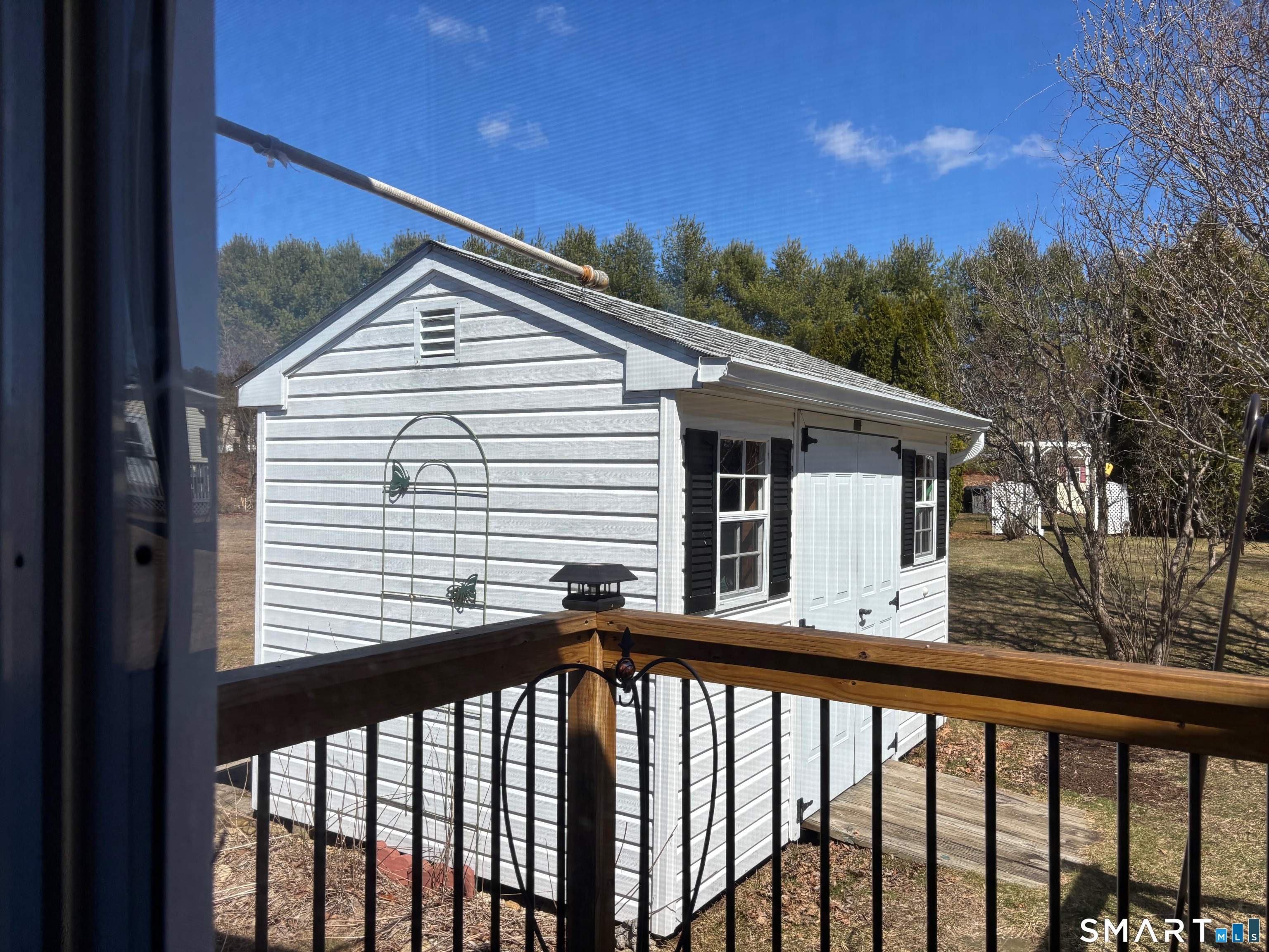 25 Kitty Lane Windham, CT 06256 - Photo 16 of 39 a view of a balcony with a tree