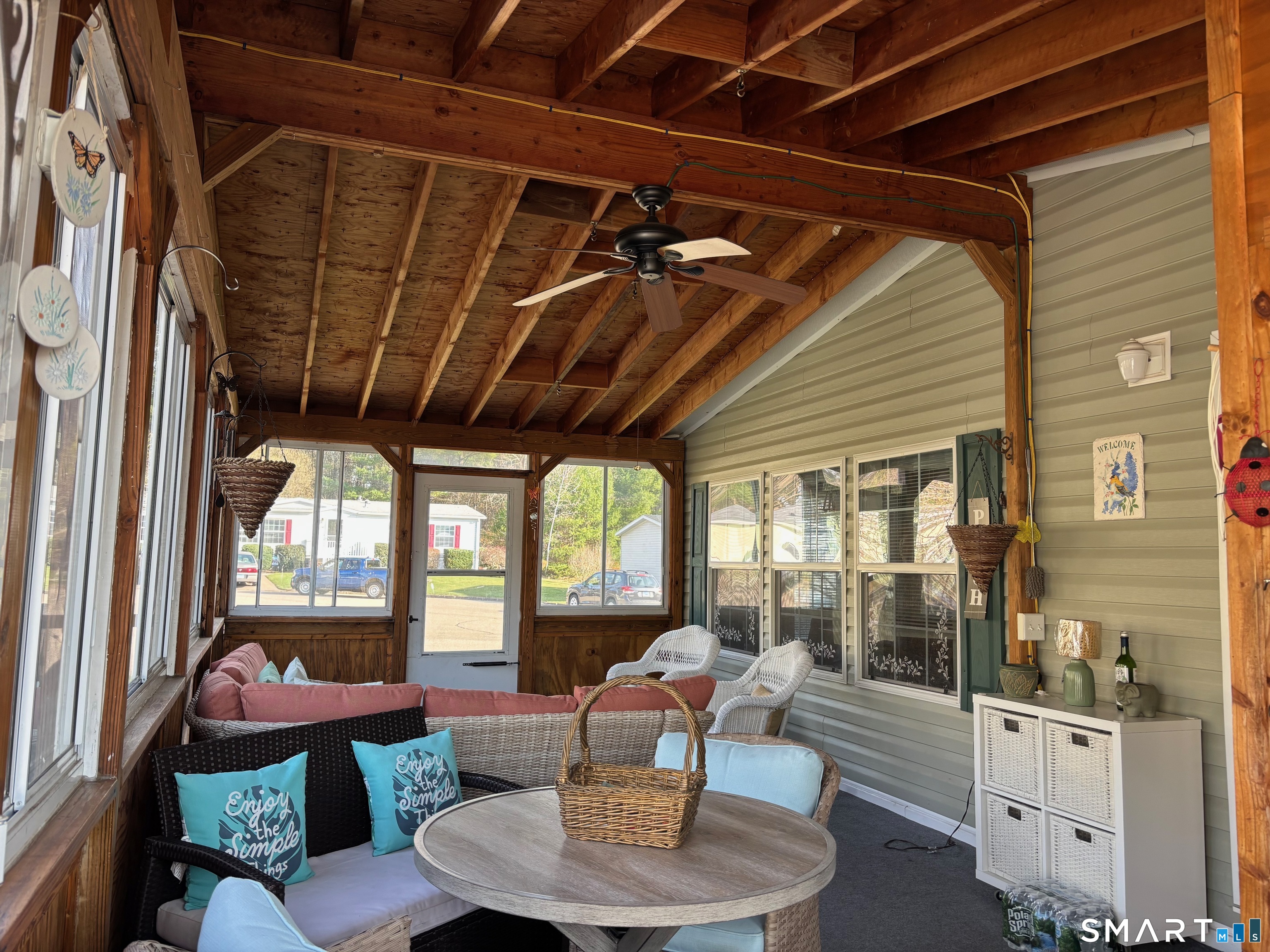 25 Kitty Lane Windham, CT 06256 - Photo 21 of 39 a living room with furniture and a floor to ceiling window