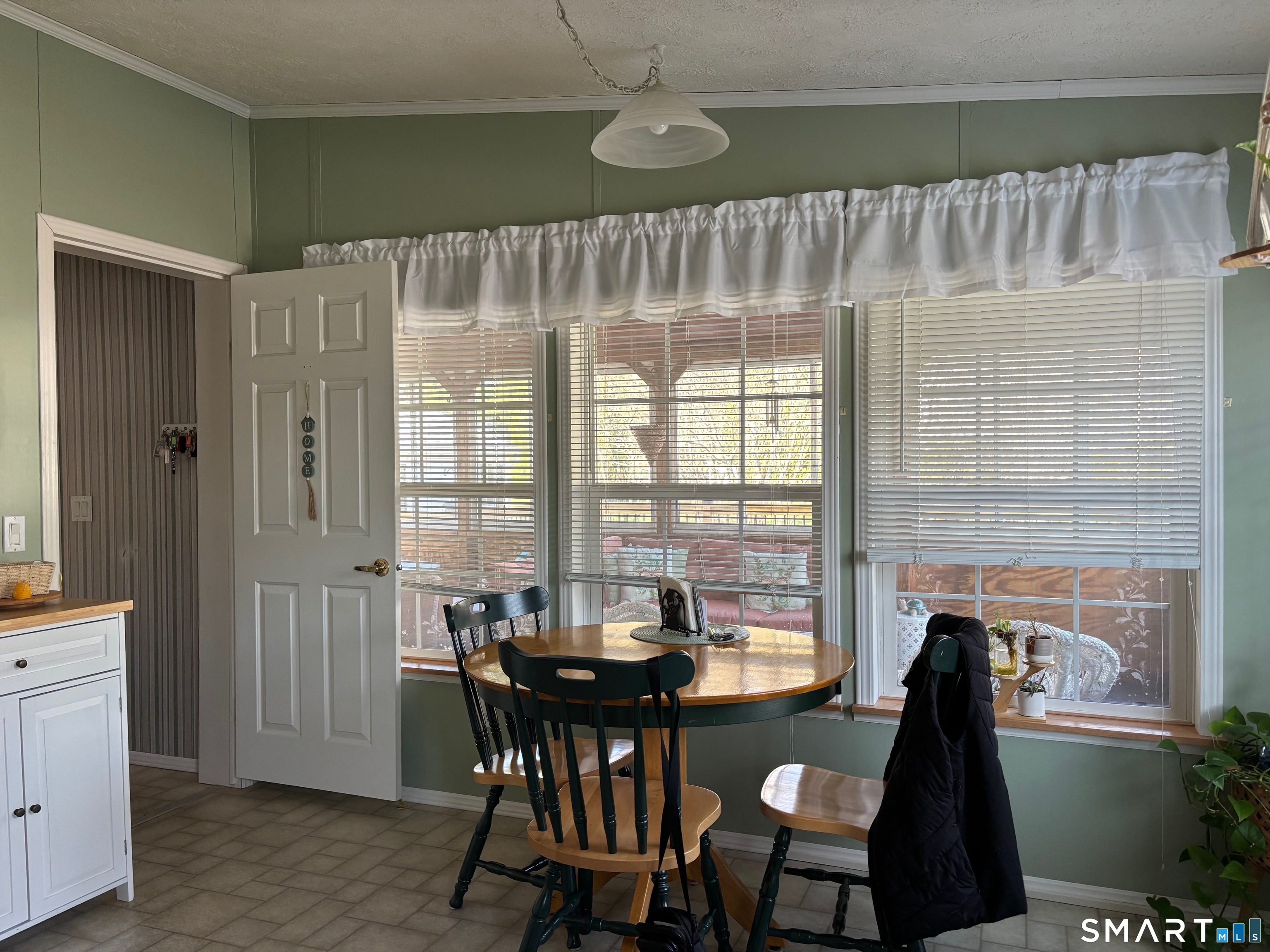 25 Kitty Lane Windham, CT 06256 - Photo 25 of 39 a dining room with furniture and window
