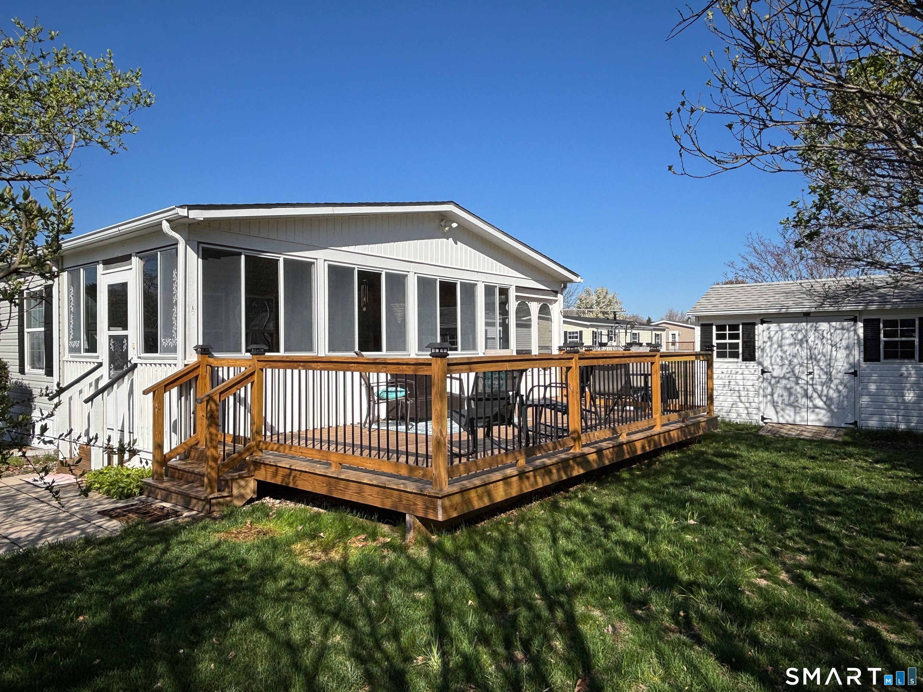 25 Kitty Lane Windham, CT 06256 - Photo 28 of 39 a view of a house with a yard and deck