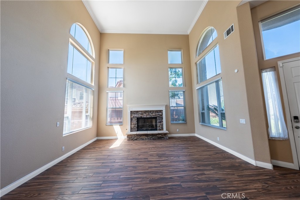 31465 Inverness Court Temecula, CA 92591 - Photo 19 of 71 a view of a livingroom with furniture window and wooden floor