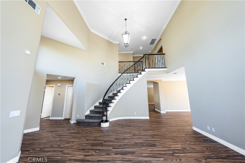 31465 Inverness Court Temecula, CA 92591 - Photo 20 of 71 a view of entryway and hall with wooden floor