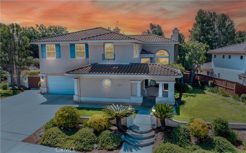 31465 Inverness Court Temecula, CA 92591 - Photo 2 of 71 a front view of a house with a yard and outdoor seating