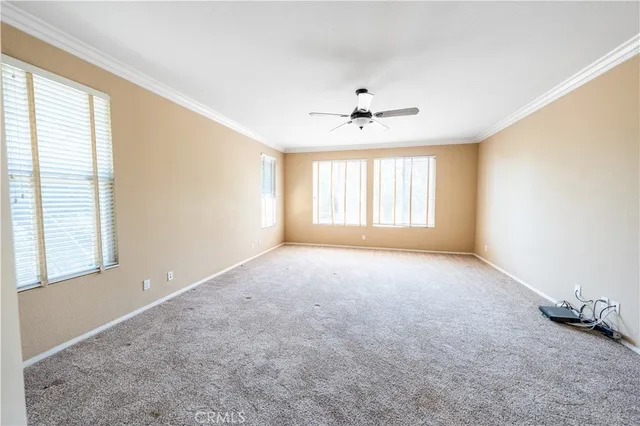 a bathroom with a granite countertop toilet and a shower