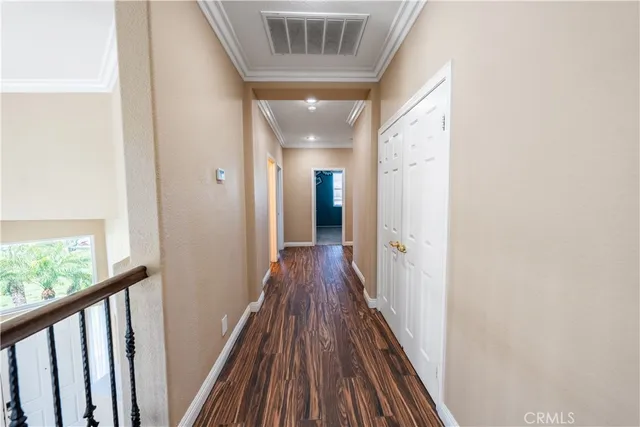 a kitchen with stainless steel appliances granite countertop a stove a refrigerator and a wooden cabinets