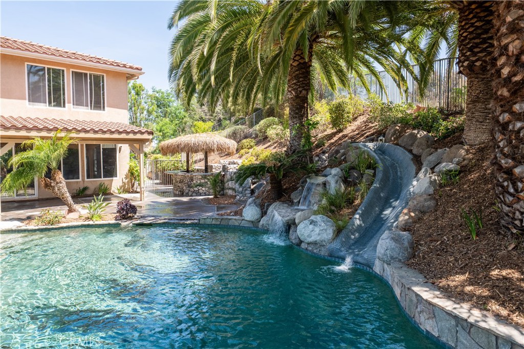 31465 Inverness Court Temecula, CA 92591 - Photo 52 of 71 a view of a house with backyard and sitting area