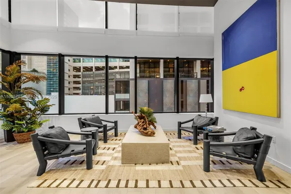 a dinning table and chairs in the patio