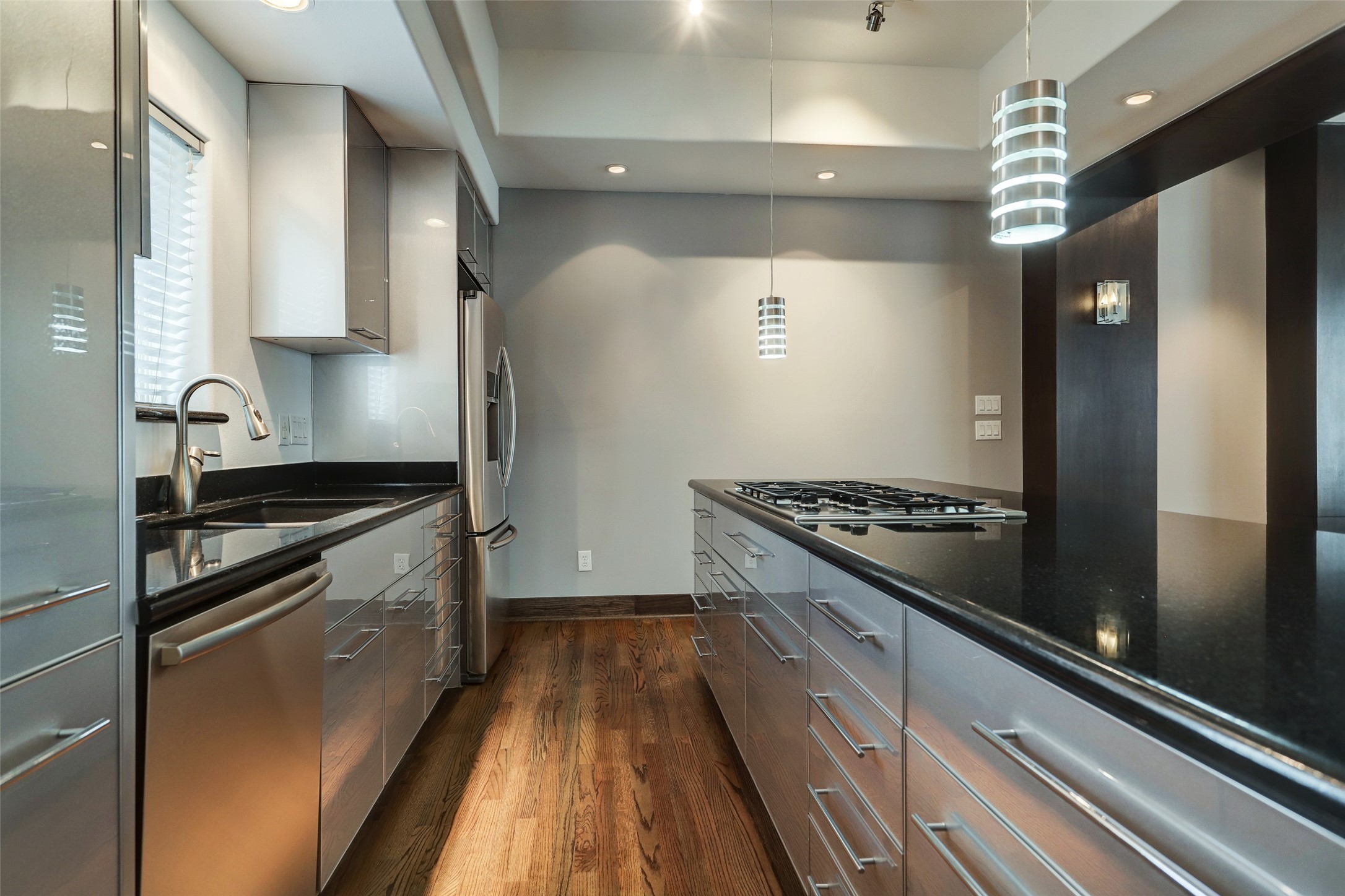 1820 Prospect Street Houston, TX 77004 - Photo 13 of 18 a kitchen with sink and stainless steel appliances