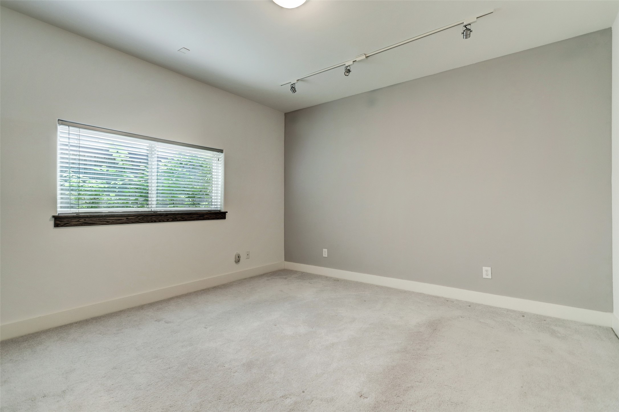 1820 Prospect Street Houston, TX 77004 - Photo 5 of 18 a view of an empty room with a window