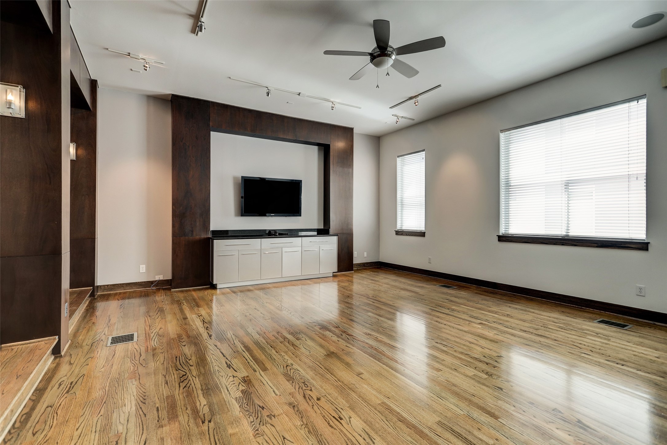 1820 Prospect Street Houston, TX 77004 - Photo 6 of 18 a view of a livingroom with wooden floor and a kitchen