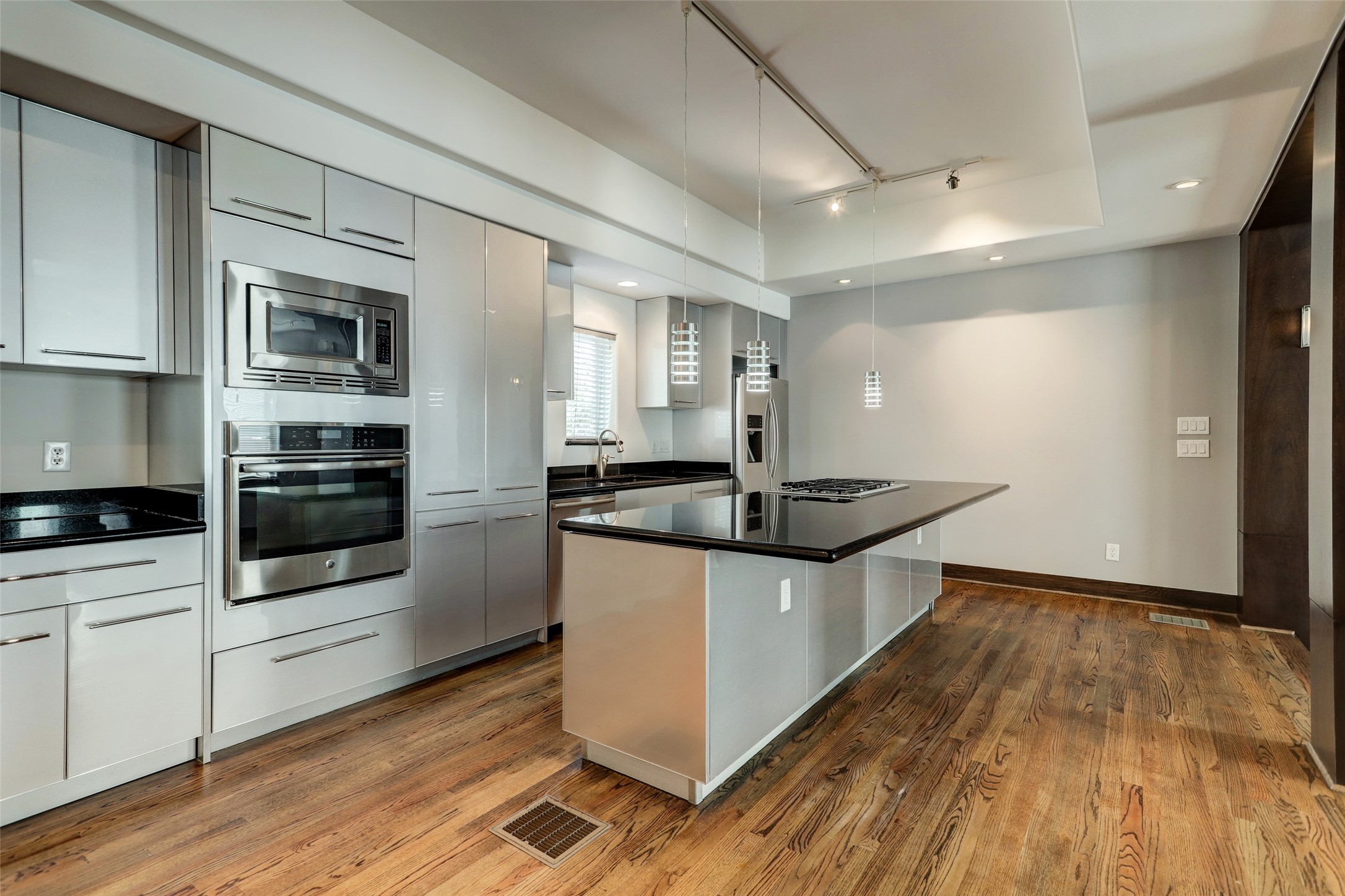 1820 Prospect Street Houston, TX 77004 - Photo 10 of 18 a kitchen with stainless steel appliances granite countertop a sink and a stove
