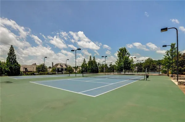 a view of a house with sitting area and furniture